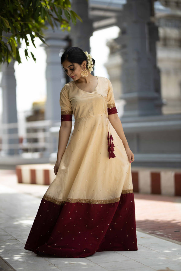 Kayalvizhi Cream and Maroon