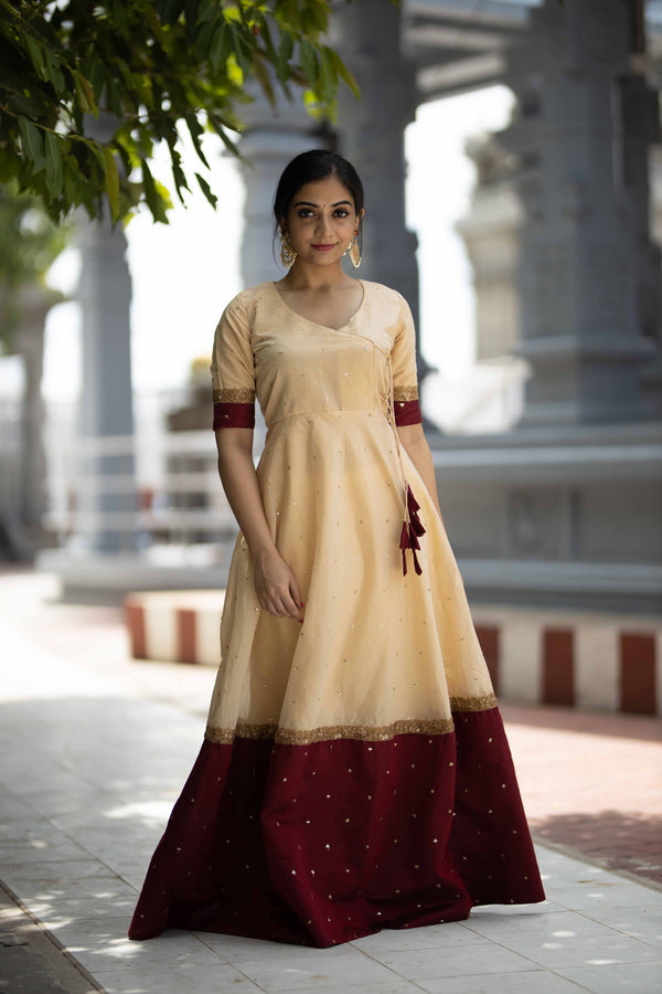 Kayalvizhi Cream and Maroon