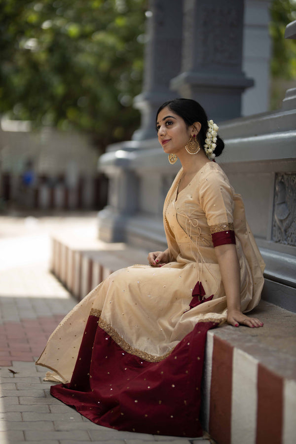 Kayalvizhi Cream and Maroon