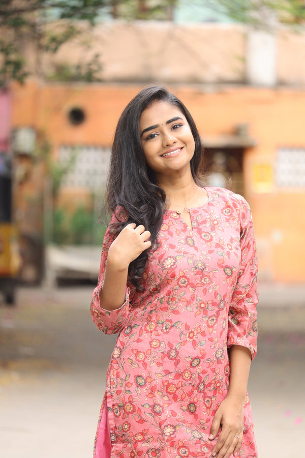 Sharnitha Peach floral kurthi