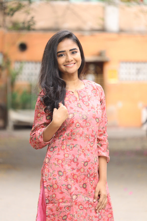 Sharnitha Peach floral kurthi