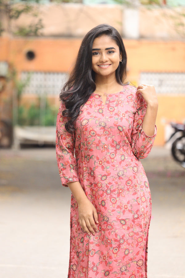 Sharnitha Peach floral kurthi