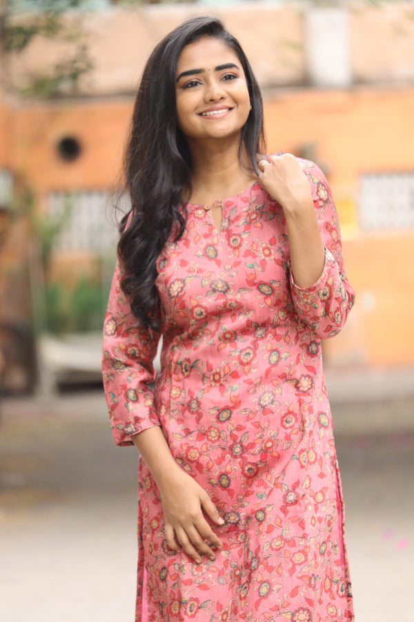 Sharnitha Peach floral kurthi