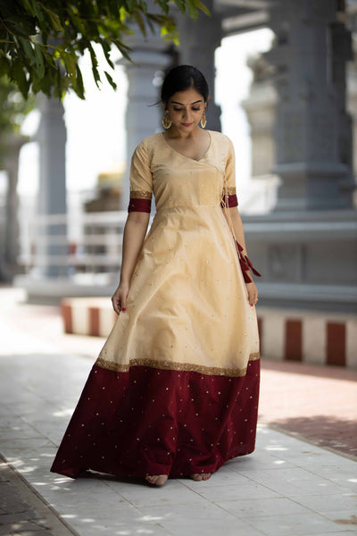 Kayalvizhi Cream and Maroon